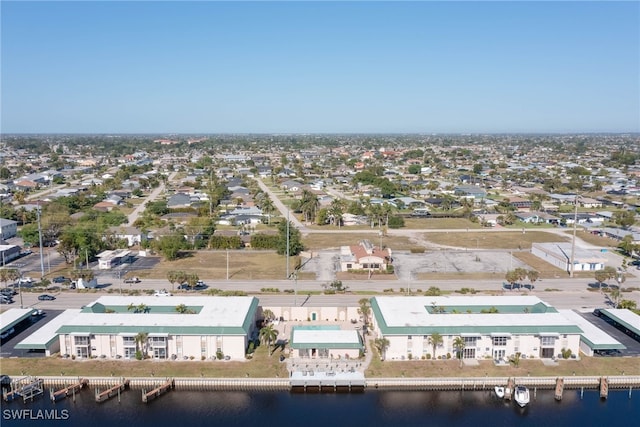 3905 Del Prado Blvd S Unit D-101, Cape Coral, FL 33904 - aerial perspective of suburban area with a large body of water