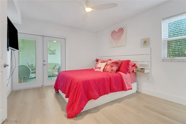 3905 Del Prado Blvd S Unit D-101, Cape Coral, FL 33904 - bedroom featuring wood finished floors, a ceiling fan, baseboards, and access to exterior