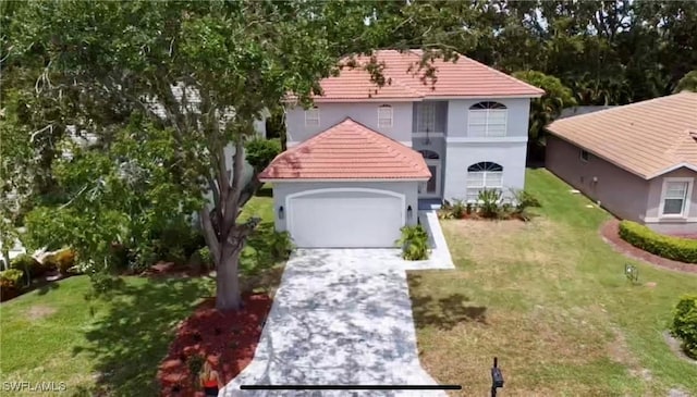 25560 Springtide Ct, Bonita Springs, FL 34135 - mediterranean / spanish home featuring a front yard, stucco siding, driveway, a garage, and a tile roof