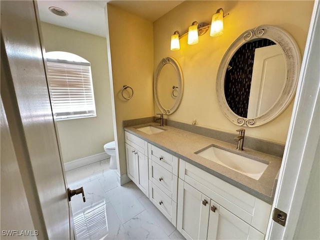 25560 Springtide Ct, Bonita Springs, FL 34135 - full bath featuring marble look tiles, double vanity, and toilet