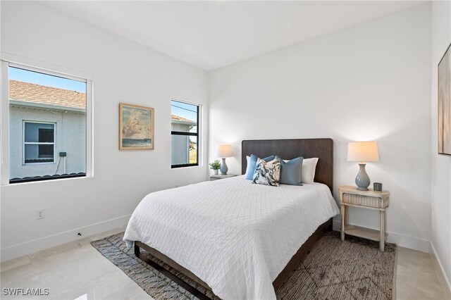 1917 NW 24th Ave, Cape Coral, FL 33993 - tiled bedroom with baseboards