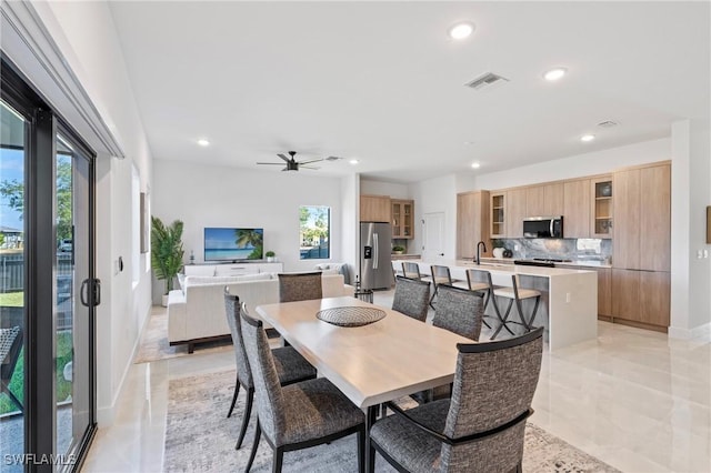 1917 NW 24th Ave, Cape Coral, FL 33993 - dining area featuring healthy amount of natural light, recessed lighting, a ceiling fan, and light tile patterned floors