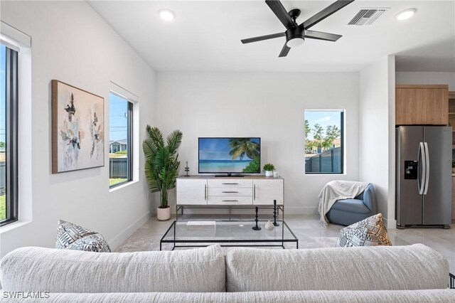 1917 NW 24th Ave, Cape Coral, FL 33993 - living area featuring healthy amount of natural light, recessed lighting, baseboards, and a ceiling fan