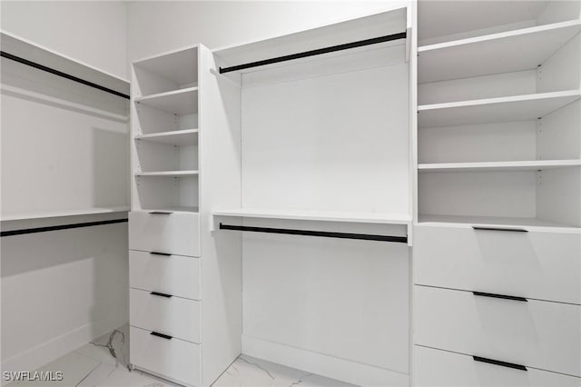 1917 NW 24th Ave, Cape Coral, FL 33993 - walk in closet featuring light marble finish flooring