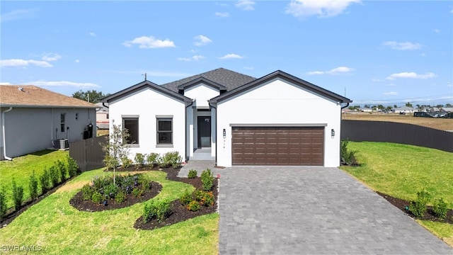 2308 NW 5th St, Cape Coral, FL 33993 - single story home featuring a garage, decorative driveway, and stucco siding