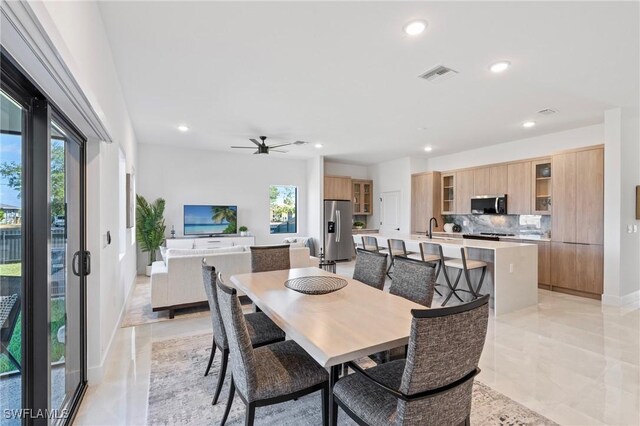 2308 NW 5th St, Cape Coral, FL 33993 - dining area featuring healthy amount of natural light, recessed lighting, a ceiling fan, and light tile patterned floors