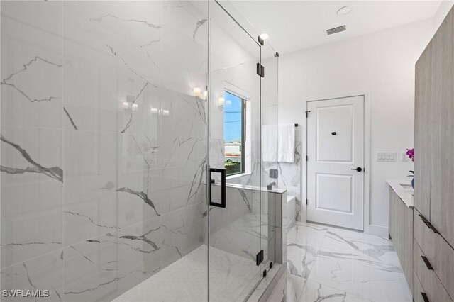 2308 NW 5th St, Cape Coral, FL 33993 - full bath featuring a marble finish shower, marble tiled floors, and recessed lighting