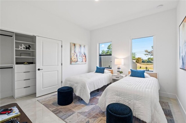 2308 NW 5th St, Cape Coral, FL 33993 - bedroom featuring baseboards