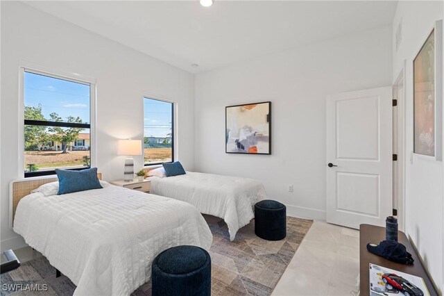 2308 NW 5th St, Cape Coral, FL 33993 - bedroom featuring baseboards and recessed lighting