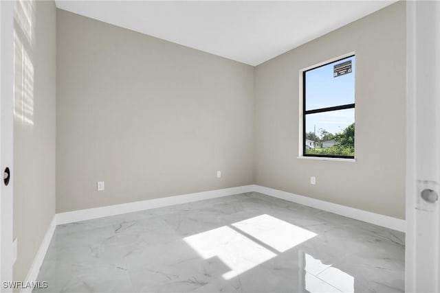 290731 St St W, Lehigh Acres, FL 33971 - empty room with marble finish floors and baseboards