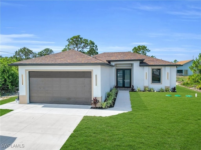 290731 St St W, Lehigh Acres, FL 33971 - view of front of house featuring french doors, stucco siding, a garage, driveway, and a front yard