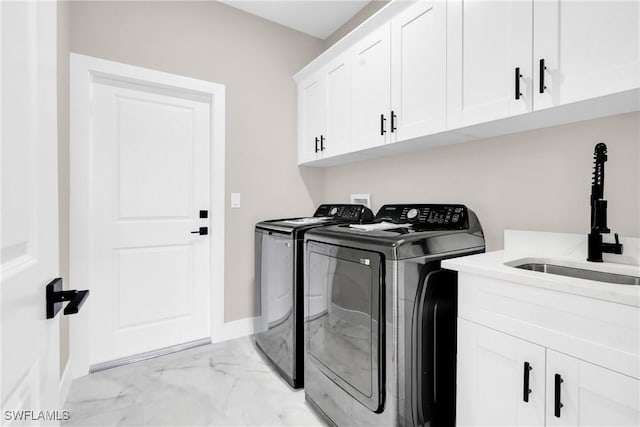 290731 St St W, Lehigh Acres, FL 33971 - laundry area with independent washer and dryer, light marble finish floors, cabinet space, and baseboards