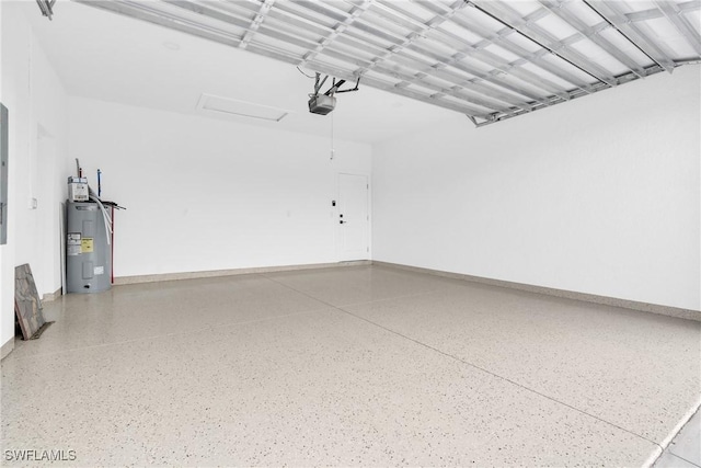 290731 St St W, Lehigh Acres, FL 33971 - garage featuring water heater, a garage door opener, and baseboards