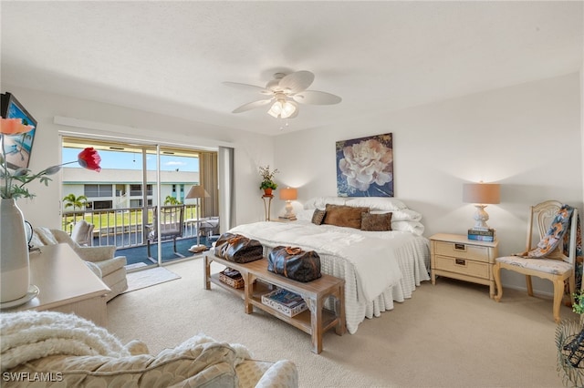 1345 SE 40th Ter Unit 2D, Cape Coral, FL 33904 - bedroom featuring access to outside, carpet floors, and ceiling fan