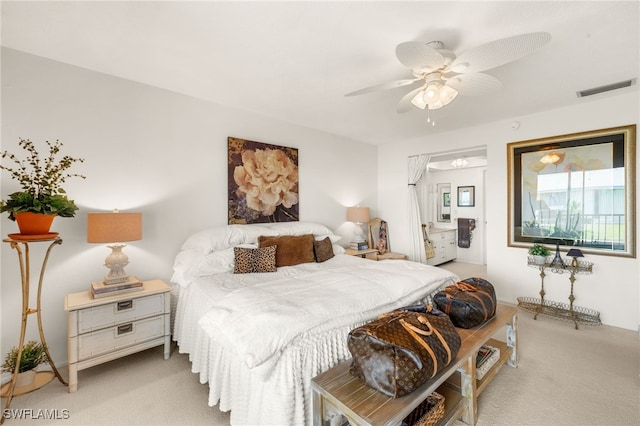 1345 SE 40th Ter Unit 2D, Cape Coral, FL 33904 - bedroom featuring light colored carpet and ceiling fan