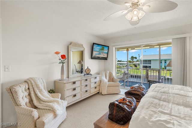 1345 SE 40th Ter Unit 2D, Cape Coral, FL 33904 - carpeted bedroom with access to exterior and ceiling fan