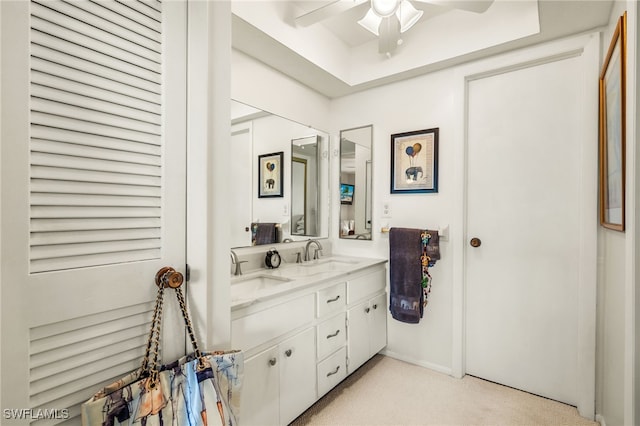 1345 SE 40th Ter Unit 2D, Cape Coral, FL 33904 - bathroom featuring double vanity and ceiling fan