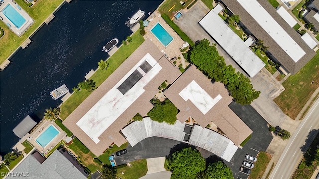 1345 SE 40th Ter Unit 2D, Cape Coral, FL 33904 - drone / aerial view of a pool area and a large body of water