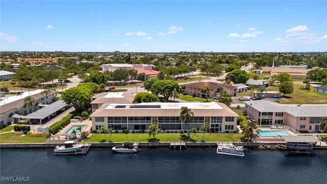 1345 SE 40th Ter Unit 2D, Cape Coral, FL 33904 - bird's eye view of a pool and a large body of water