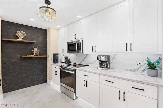 5793 Cape Harbour Dr Unit 1119, Cape Coral, FL 33914 - kitchen featuring appliances with stainless steel finishes, open shelves, light marble finish flooring, white cabinetry, and light stone counters