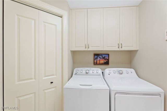 5793 Cape Harbour Dr Unit 1119, Cape Coral, FL 33914 - laundry room featuring washing machine and dryer and cabinet space