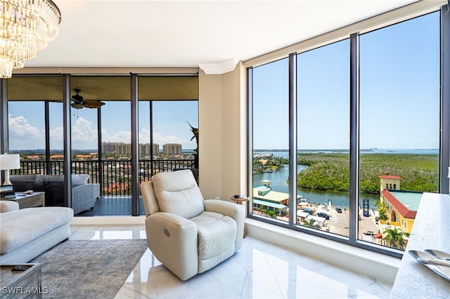 5793 Cape Harbour Dr Unit 1119, Cape Coral, FL 33914 - sunroom / solarium featuring a water view and a chandelier