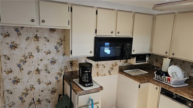 27625 Michigan St, Bonita Springs, FL 34135 - kitchen with dishwasher, black microwave, cream cabinets, and dark countertops