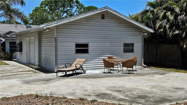 27625 Michigan St, Bonita Springs, FL 34135 - rear view of house featuring a patio