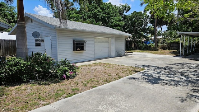 27625 Michigan St, Bonita Springs, FL 34135 - detached garage featuring concrete driveway