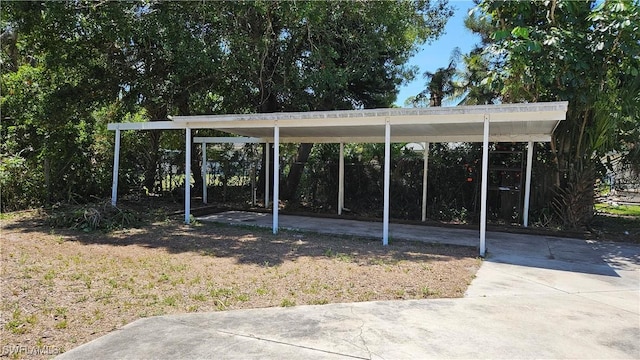 27625 Michigan St, Bonita Springs, FL 34135 - view of yard with a carport and driveway