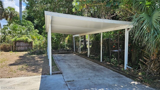27625 Michigan St, Bonita Springs, FL 34135 - view of patio / terrace with driveway and a carport