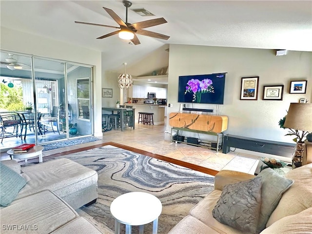 352 Paisley Ave, Lehigh Acres, FL 33974 - living room with a ceiling fan and lofted ceiling