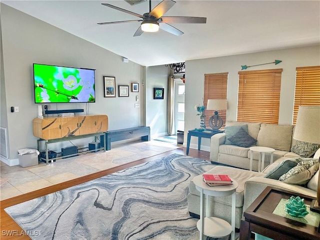 352 Paisley Ave, Lehigh Acres, FL 33974 - living area with ceiling fan, vaulted ceiling, and wood finished floors