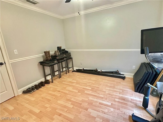 352 Paisley Ave, Lehigh Acres, FL 33974 - exercise area with ornamental molding, wood finished floors, and ceiling fan