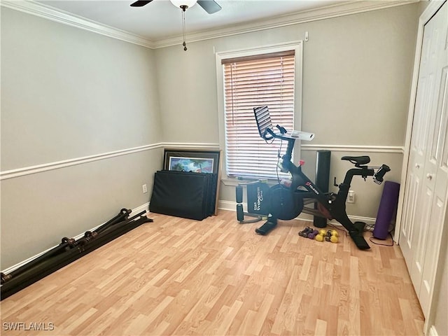 352 Paisley Ave, Lehigh Acres, FL 33974 - exercise area with wood finished floors, a ceiling fan, and ornamental molding
