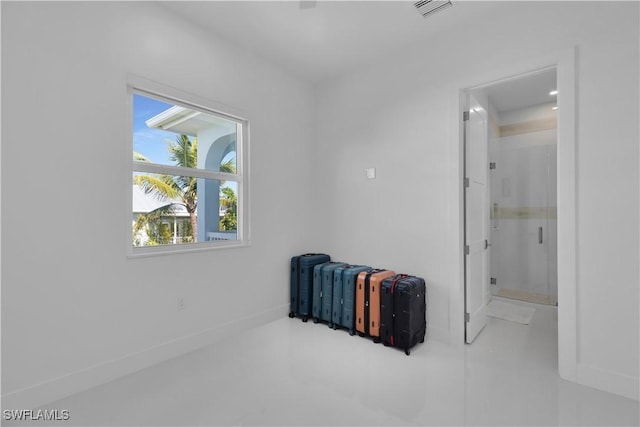 518 Avenida Primiceria, Marathon, FL 33050 - unfurnished bedroom featuring ensuite bathroom and baseboards