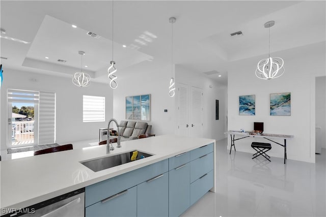 518 Avenida Primiceria, Marathon, FL 33050 - kitchen featuring a raised ceiling, a sink, open floor plan, stainless steel dishwasher, and light countertops