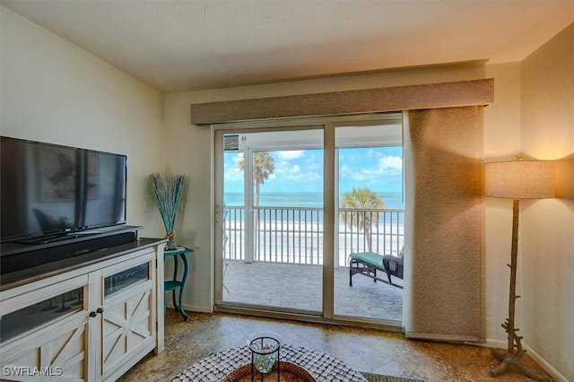 5000 Estero Blvd Unit 202, Fort Myers Beach, FL 33931 - doorway to outside with a water view and baseboards