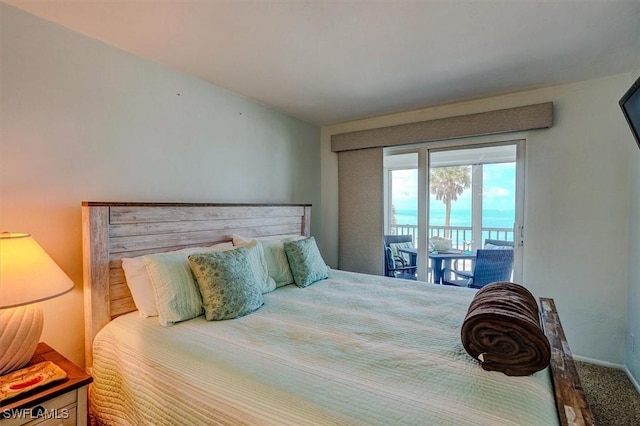 5000 Estero Blvd Unit 202, Fort Myers Beach, FL 33931 - carpeted bedroom with access to exterior and baseboards