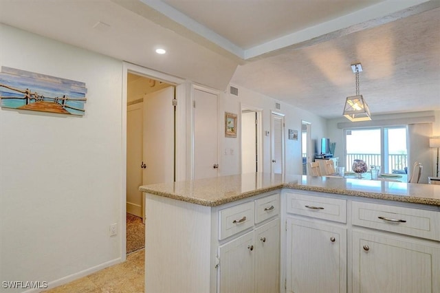 5000 Estero Blvd Unit 202, Fort Myers Beach, FL 33931 - kitchen featuring white cabinets, pendant lighting, light stone countertops, baseboards, and recessed lighting