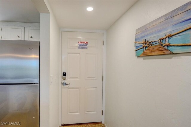 5000 Estero Blvd Unit 202, Fort Myers Beach, FL 33931 - doorway to outside with recessed lighting and baseboards