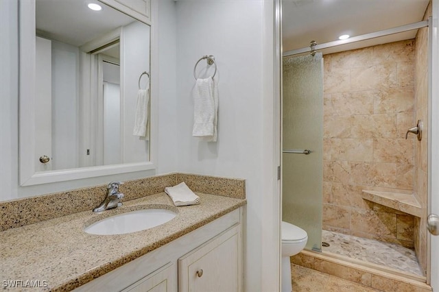 5000 Estero Blvd Unit 202, Fort Myers Beach, FL 33931 - bathroom with a stall shower, toilet, vanity, and recessed lighting