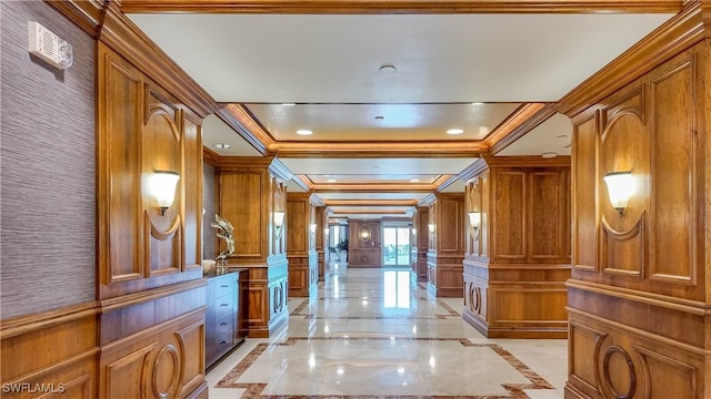 4021 Gulf Shore Blvd N Unit 1704, Naples, FL 34103 - corridor featuring inlaid floor details, ornamental molding, light marble finish floors, a decorative wall, and decorative columns