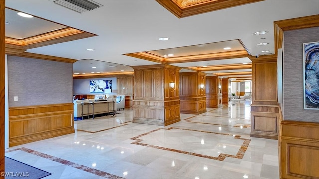 4021 Gulf Shore Blvd N Unit 1704, Naples, FL 34103 - corridor with ornamental molding, inlaid floor details, a raised ceiling, ornate columns, and recessed lighting