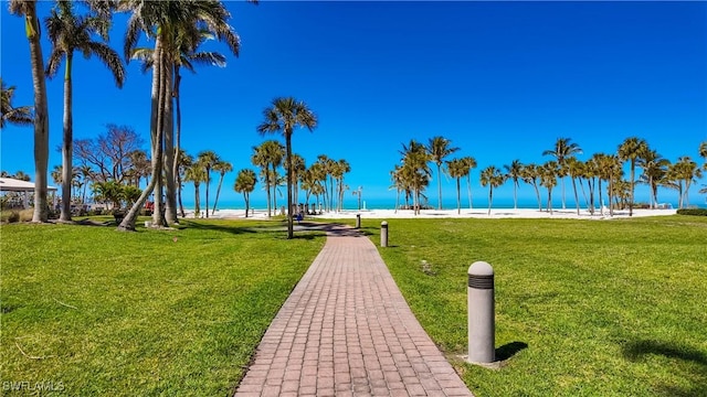 4021 Gulf Shore Blvd N Unit 1704, Naples, FL 34103 - surrounding community featuring a yard and view of water and beach