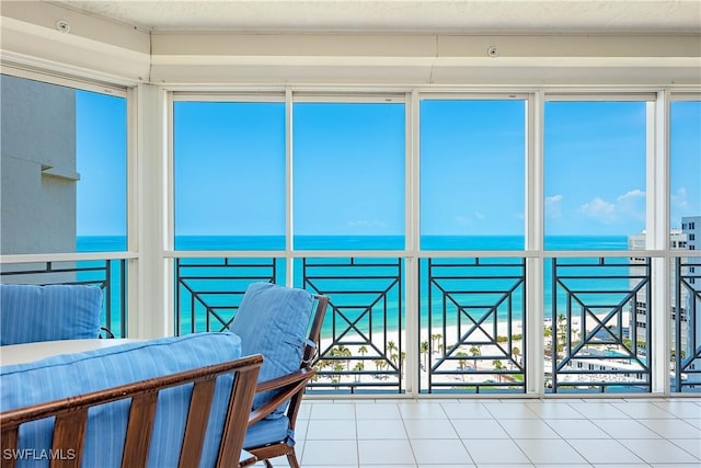 4021 Gulf Shore Blvd N Unit 1704, Naples, FL 34103 - sunroom / solarium featuring a water view