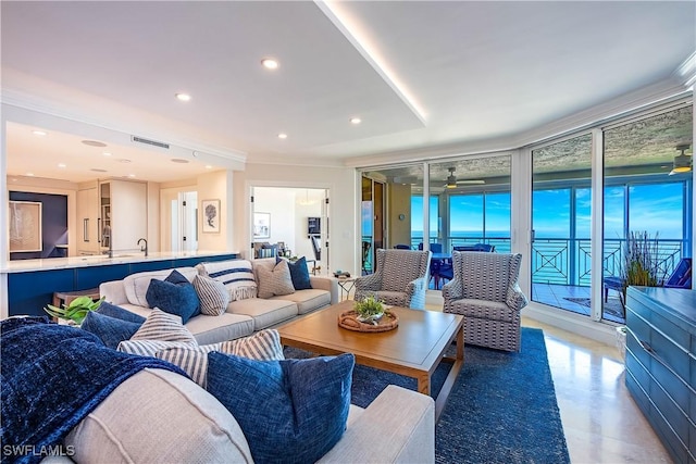 4021 Gulf Shore Blvd N Unit 1704, Naples, FL 34103 - living room with recessed lighting, ceiling fan, and a wall of windows