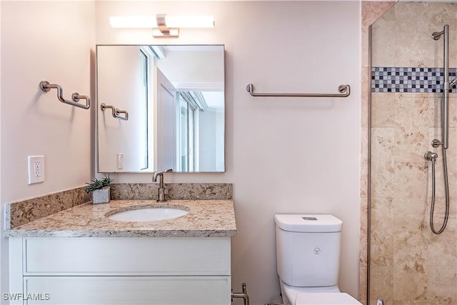 4021 Gulf Shore Blvd N Unit 1704, Naples, FL 34103 - bathroom with vanity, a stall shower, and toilet