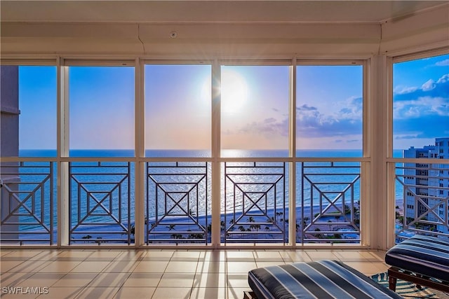 4021 Gulf Shore Blvd N Unit 1704, Naples, FL 34103 - unfurnished sunroom with a water view