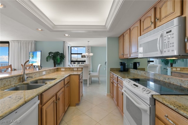 300 S Collier Blvd Unit 2304, Marco Island, FL 34145 - kitchen featuring white appliances, a sink, light stone countertops, light tile patterned floors, and recessed lighting